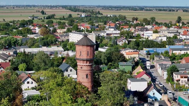 Aerial Strzelno Poland historic water tower city center. Central north Poland. German occupation World War II. Farm rural area. Historical trade and religious center. Historic buildings rural village.