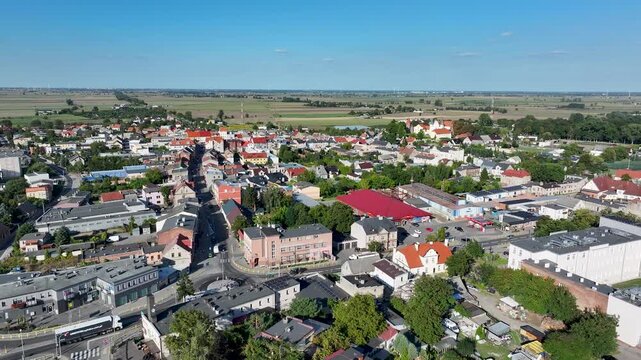 Aerial Strzelno Poland city center slide pull. Central north Poland. German occupation World War II. Farm rural area. Historical trade and religious center. Historic buildings rural village.