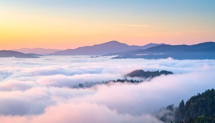 Fototapeta premium Serene Sunrise Over Misty Mountains and Clouds at Dawn