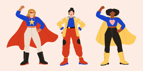Three diverse women in superhero costumes standing confidently with fists raised