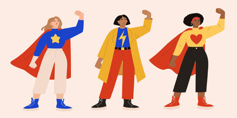 Diverse women in superhero poses with capes and bold colors representing strength and empowerment
