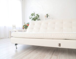 White couch in a bright, modern living room