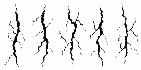 Obraz premium Set of five black crack illustrations on a white background representing seismic activity or structural damage