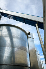 Naklejka premium Metal grain storage silos - vertical