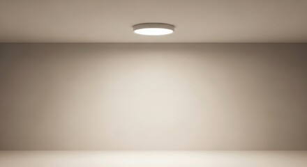 Minimalist ceiling light glowing softly on plain wall interior background.