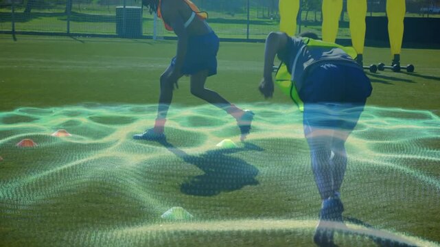 Finishing plank tucks, players sprinting toward cones performing lateral hops for soccer agility