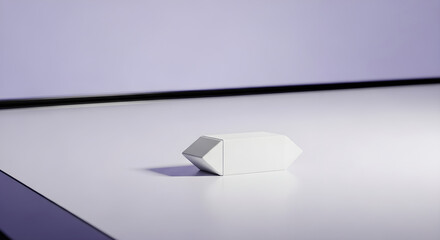 A minimalist white hexagonal prism object casts a shadow on a light grey surface