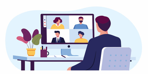 Man participating in a video conference call with colleagues from home office