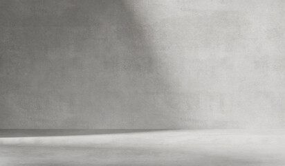 Gray background with cement wall texture. Minimalist abstract background for product presentations with soft shadows from the window
