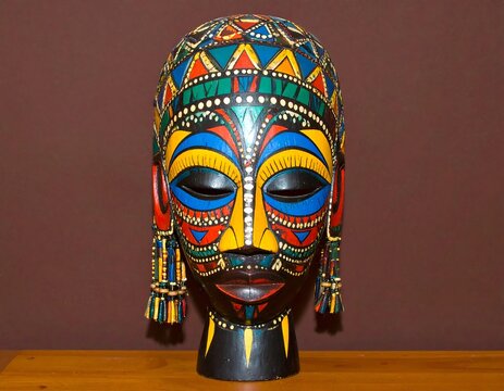 Vibrant painted wooden mask, African style