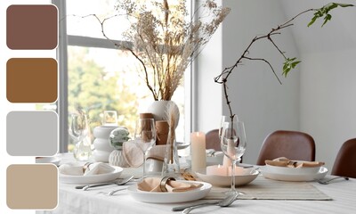 Elegant table setting with floral decor and candles in dining room. Different color patterns