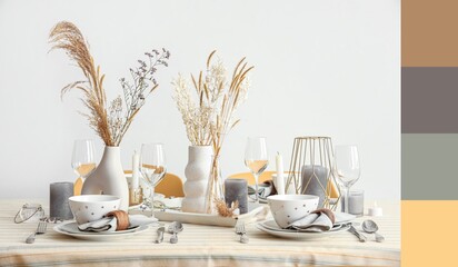 Elegant table setting with floral decor in dining room. Different color patterns