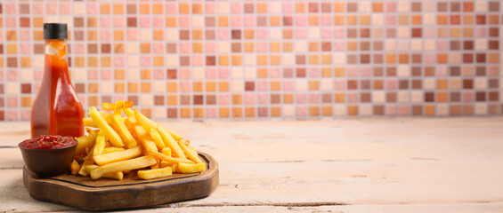 Tasty french fries and ketchup on wooden table. Banner for design