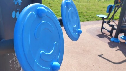 Outdoor fitness equipment in local park for all ages