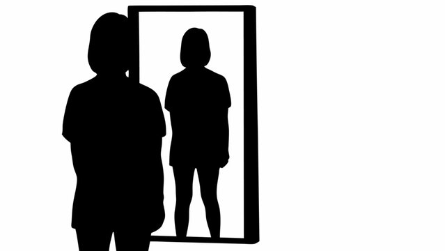 Silhouette of a person standing in front of a mirror reflecting their image in black and white tone art