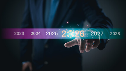 Business Hand Touching 2026 Future Timeline for Strategy and Growth © Ao Zaa Studio