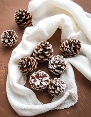 Pinecones on a white cloth