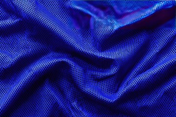 Draped blue fabric with textured holes