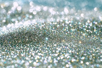 Sparkling silver glitter texture with bokeh