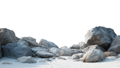 A panoramic view of large gray rocks on a white sandy beach