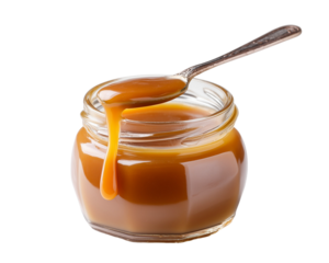 Caramel Sauce in Glass Jar with Spoon