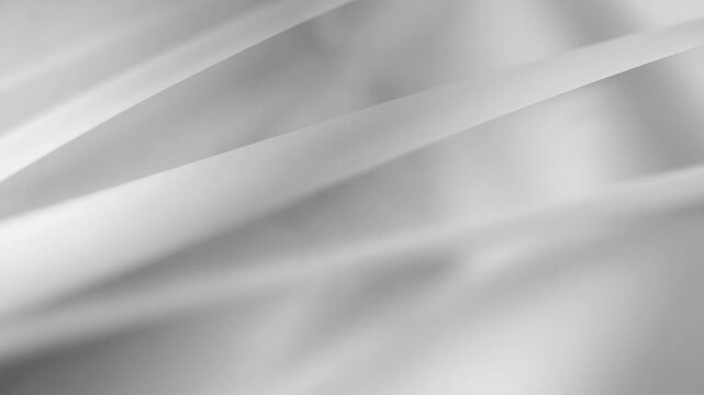 Abstract flowing silver fabric with smooth silky texture in monochrome shades