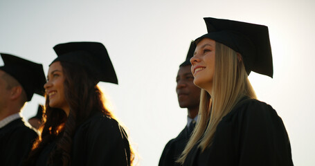 University, outdoor and woman with achievement, graduation and success with education. Happiness,...
