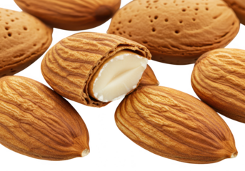 Closeup of almonds, one cracked open, isolated on transparent background