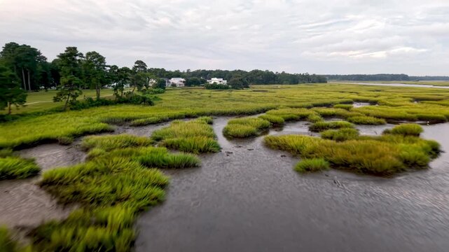 aerial over real estate and marshlands near calabash nc