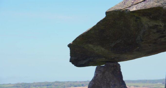 Panning sot of the capstone of pentre Ifan Burial chamber at Nevern