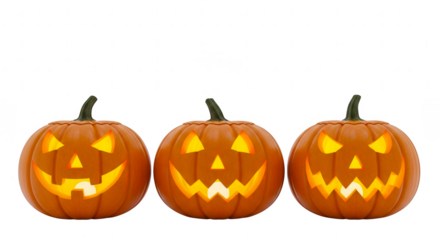 Three glowing carved halloween pumpkins with spooky faces in a row isolated on transparent background