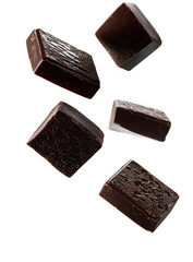 Dark chocolate squares in mid-air (1)