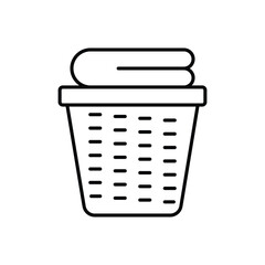 A laundry basket with folded towels The basket has vertical slits. Editable stroke. Icon vector illustration