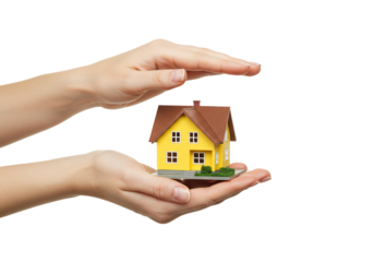 Hands protecting small yellow house model home ownership real estate security concept