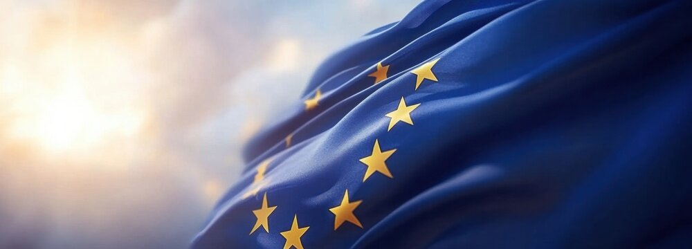 Close-up flag European Union waving wind blue background