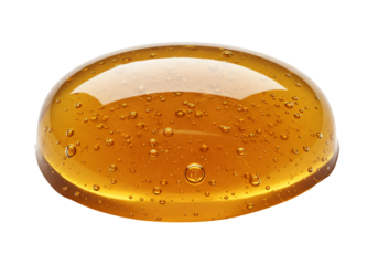 Amber honey drop with air bubbles transparent background