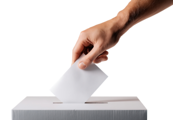 A hand placing a ballot into a voting box