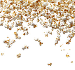 Close-up of popcorn kernels, light tan color, scattered, some falling