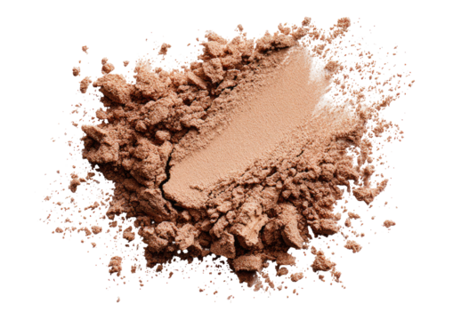 Light brown powder explosion.  A pile of light brown powder, in a slightly uneven, exploded or scattered formation, with a lighter, almost beige, patch in the center