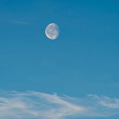 Peaceful moon in a clear sky