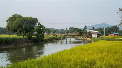 Peaceful river scene with bridge and green fields