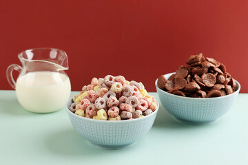Two Bowls of Cereal, Colorful Ring and Chocolate Flakes