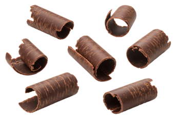 Dark brown chocolate curls floating transparent background food photography confectionery sweet treat dessert ingredient culinary image