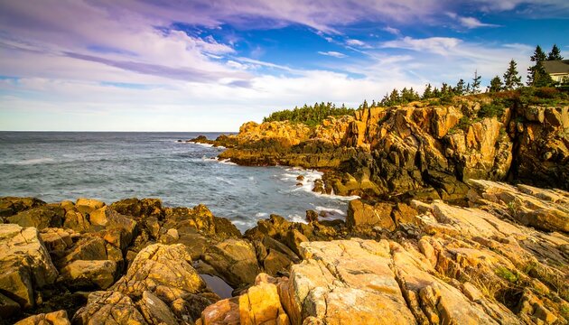 Rocky coast, ocean waves, blue sky