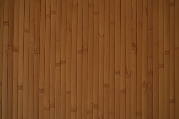 Naklejka premium Bamboo wood panel texture, vertical bamboo slats, natural brown wooden background