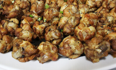 Authentic Thai Fried Chicken with Crispy Texture, Asian Street Food Appetizer, Delicious Deep-Fried Chicken Dish for Restaurant and Food Photography Stock