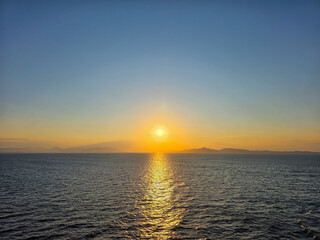 Mediterranean summer golden sunset at sea 