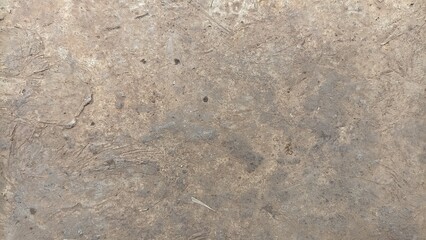 Weathered Stone and Dirt Ground. Abstract Earthen Texture with Varied Tones of Brown and Grey. Natural Grunge Background.