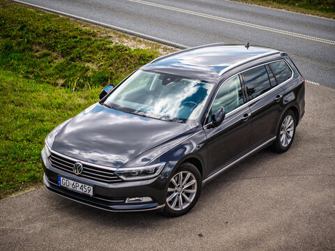 Gdansk, Poland - August 18, 2024: Aerial view of the Volkswagen Passat B8 car parked at the road