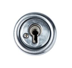 Obraz premium Close-up of a circular metal lock keyhole. A key is inserted